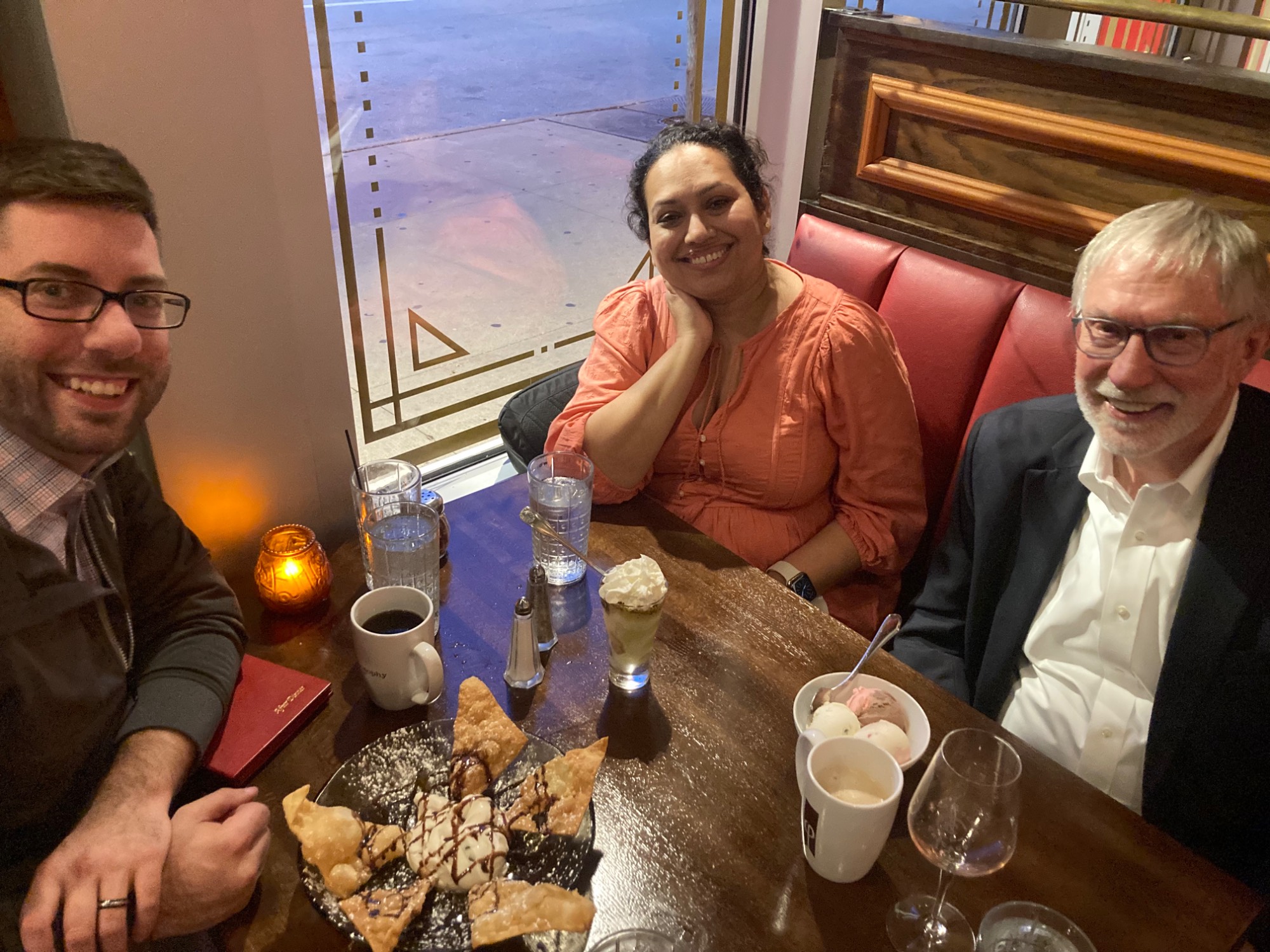 Three people at a restaurant